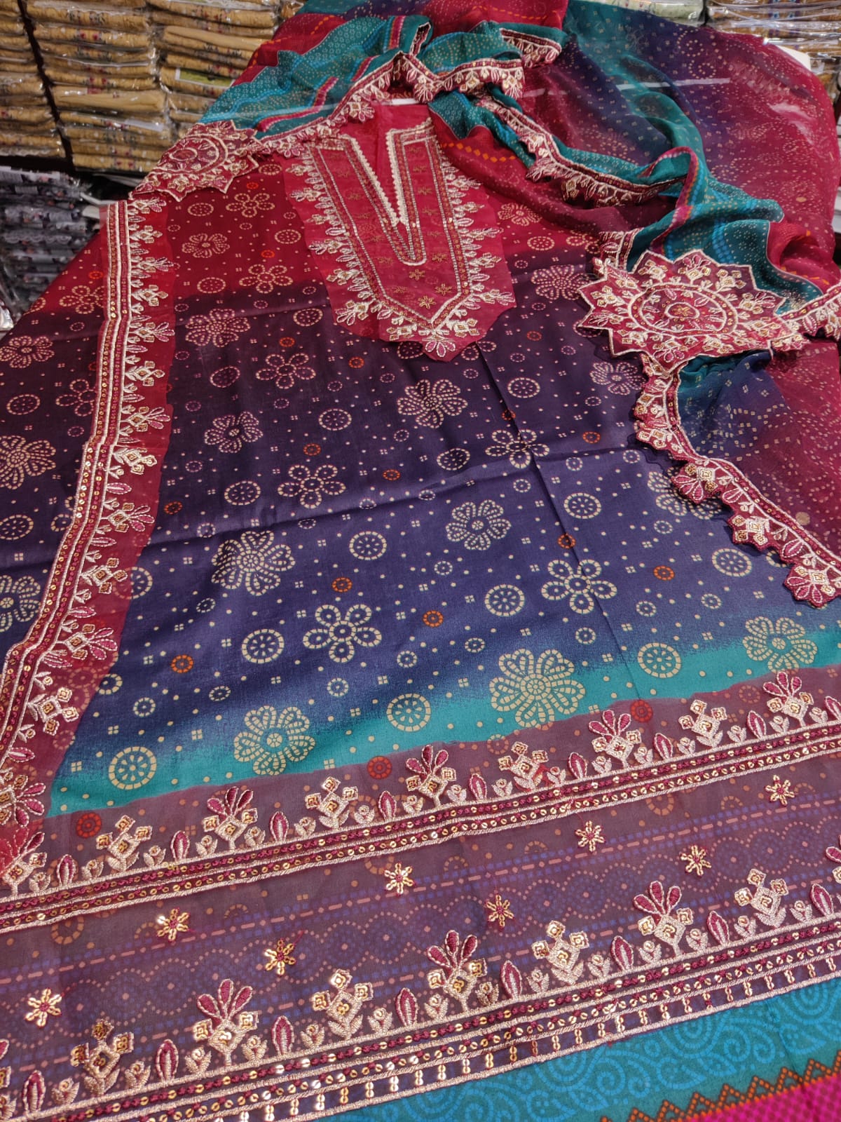 Colorful new choti chunri from Danish Cloth with intricate patterns, traditional Indian fabric for festive or ceremonial wear.