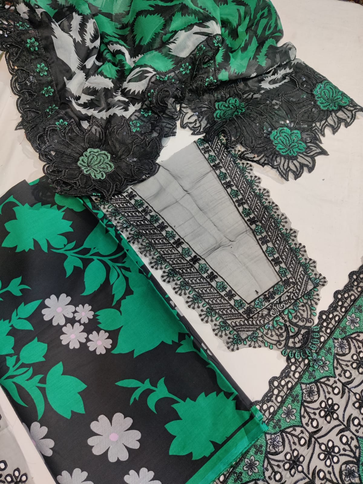 Green Ramsha Naba from Danish Cloth, new traditional fabric with intricate patterns and vibrant green color.