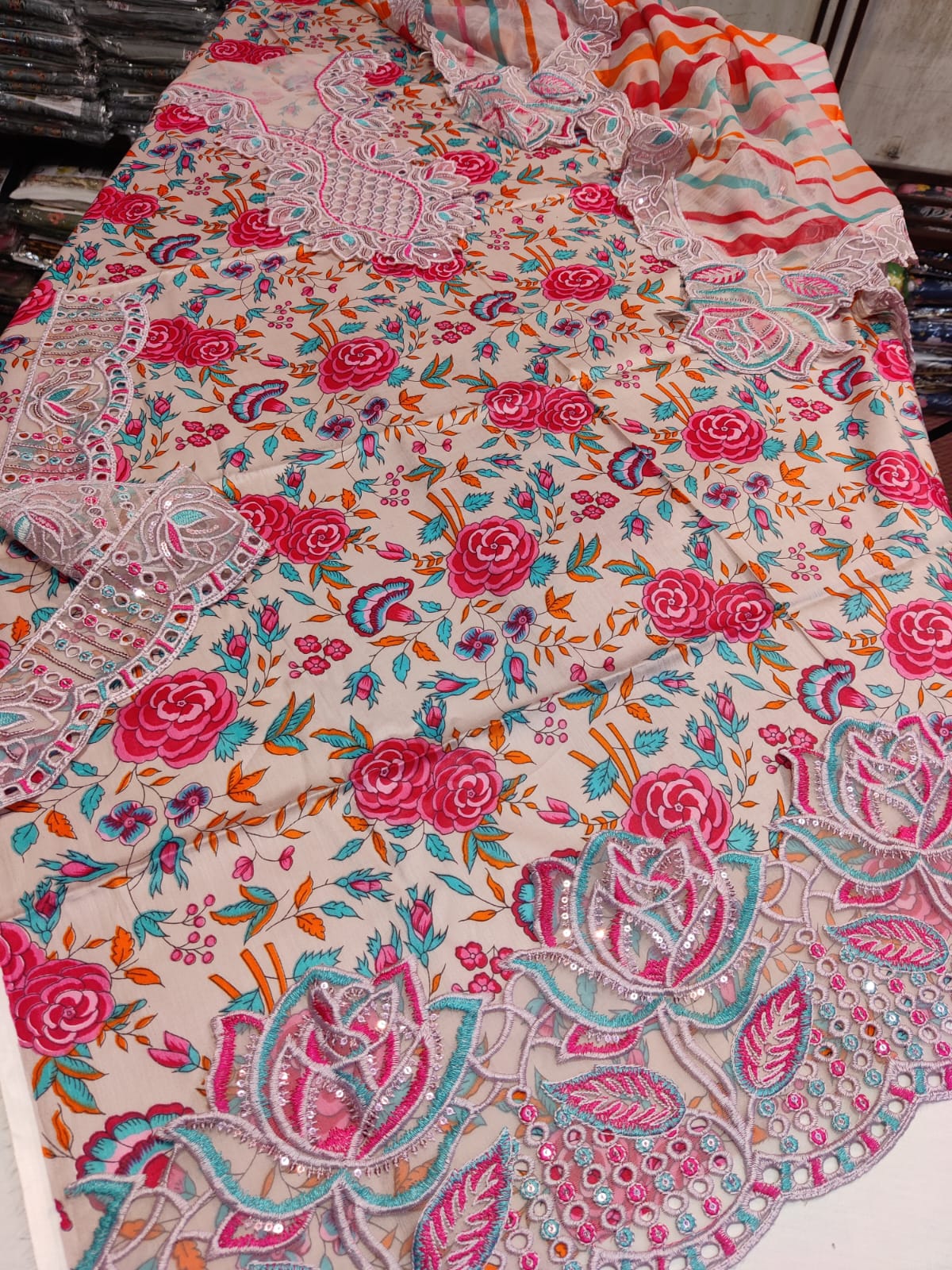 Naba Aneela's Danish Cloth with colorful floral pattern, durable fabric, ideal for home decor or crafting projects