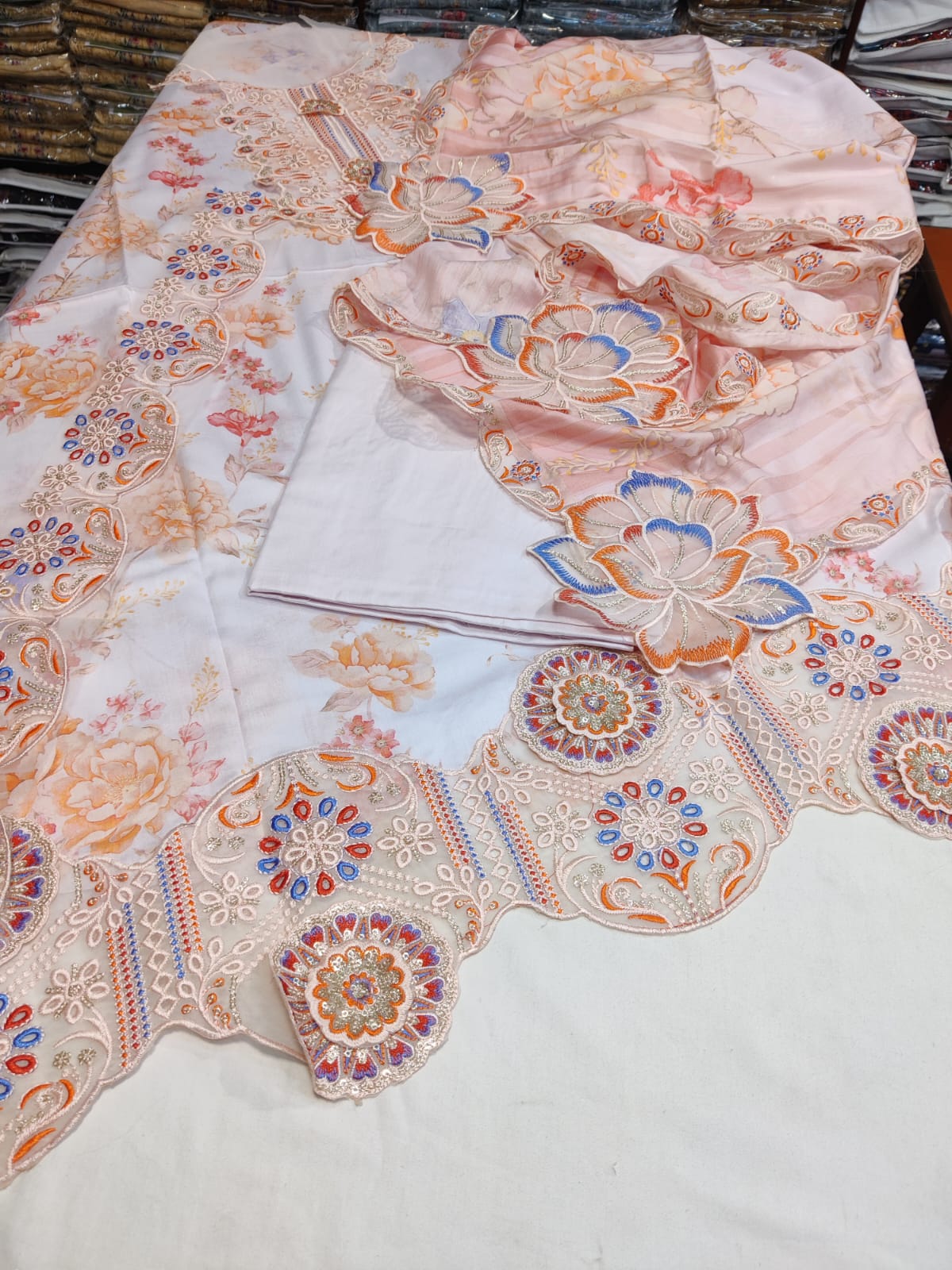 New Danish Cloth Agha lawn dupatta with intricate embroidery, lightweight fabric, and vibrant colors for elegant traditional wear.