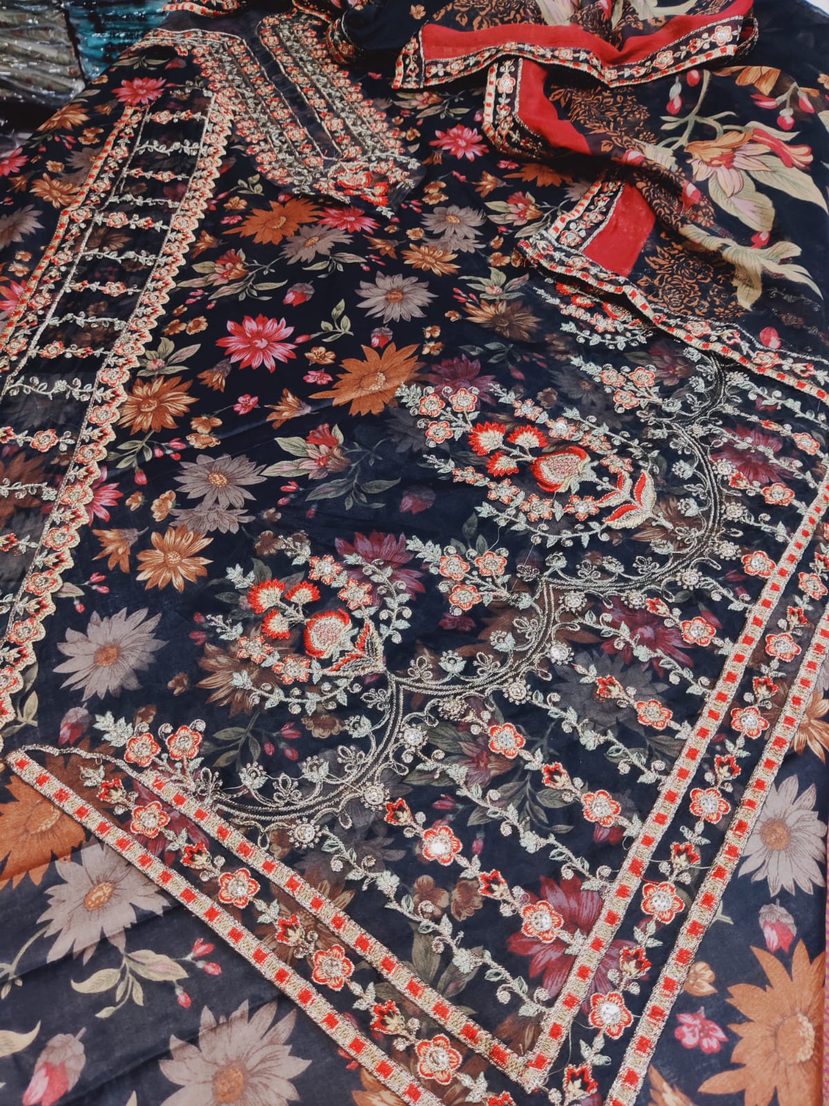 Moghani 2.0 by Danish Cloth, showcasing a stylish, textured design in a vibrant color.