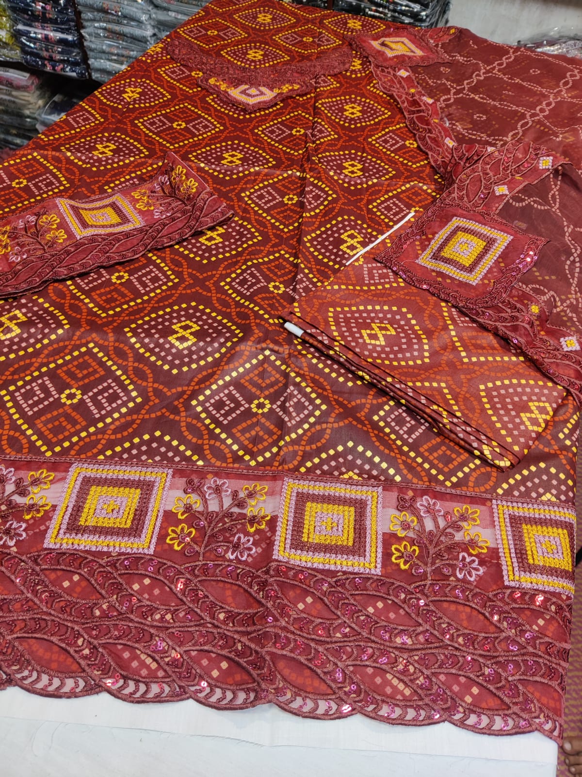 Colorful Danish Cloth Chunri Mherron with intricate patterns, traditional Indian textile showcasing vibrant embroidery and design details.