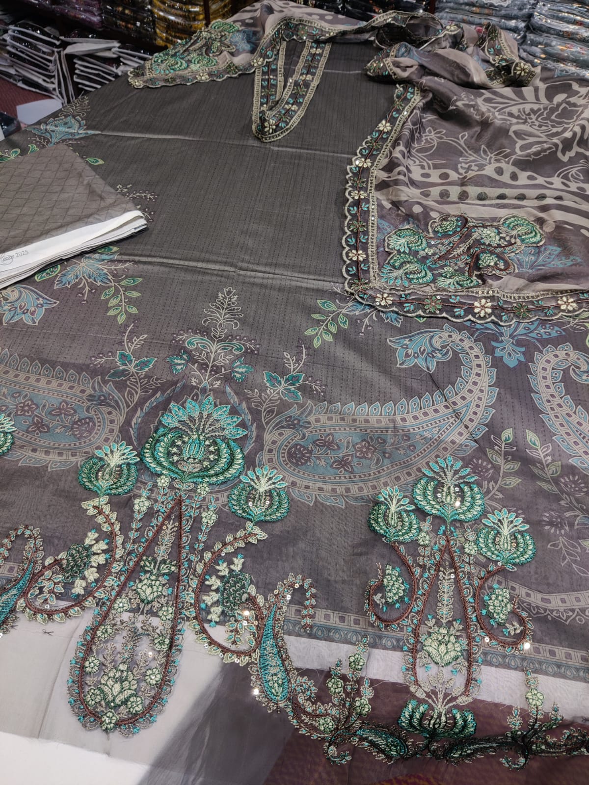 Gray Maria.b dress by Danish Cloth, new arrival, showcasing a stylish, comfortable design with intricate details.