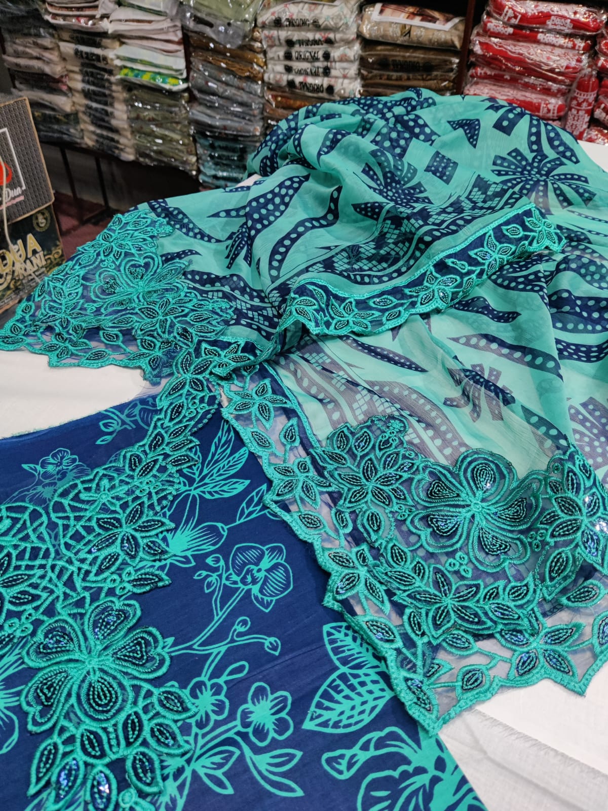 Danish Cloth Aneela's Blueberry fabric featuring a vibrant blueberry pattern on soft, high-quality textile material.